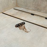 Upchatý odtok v sprche